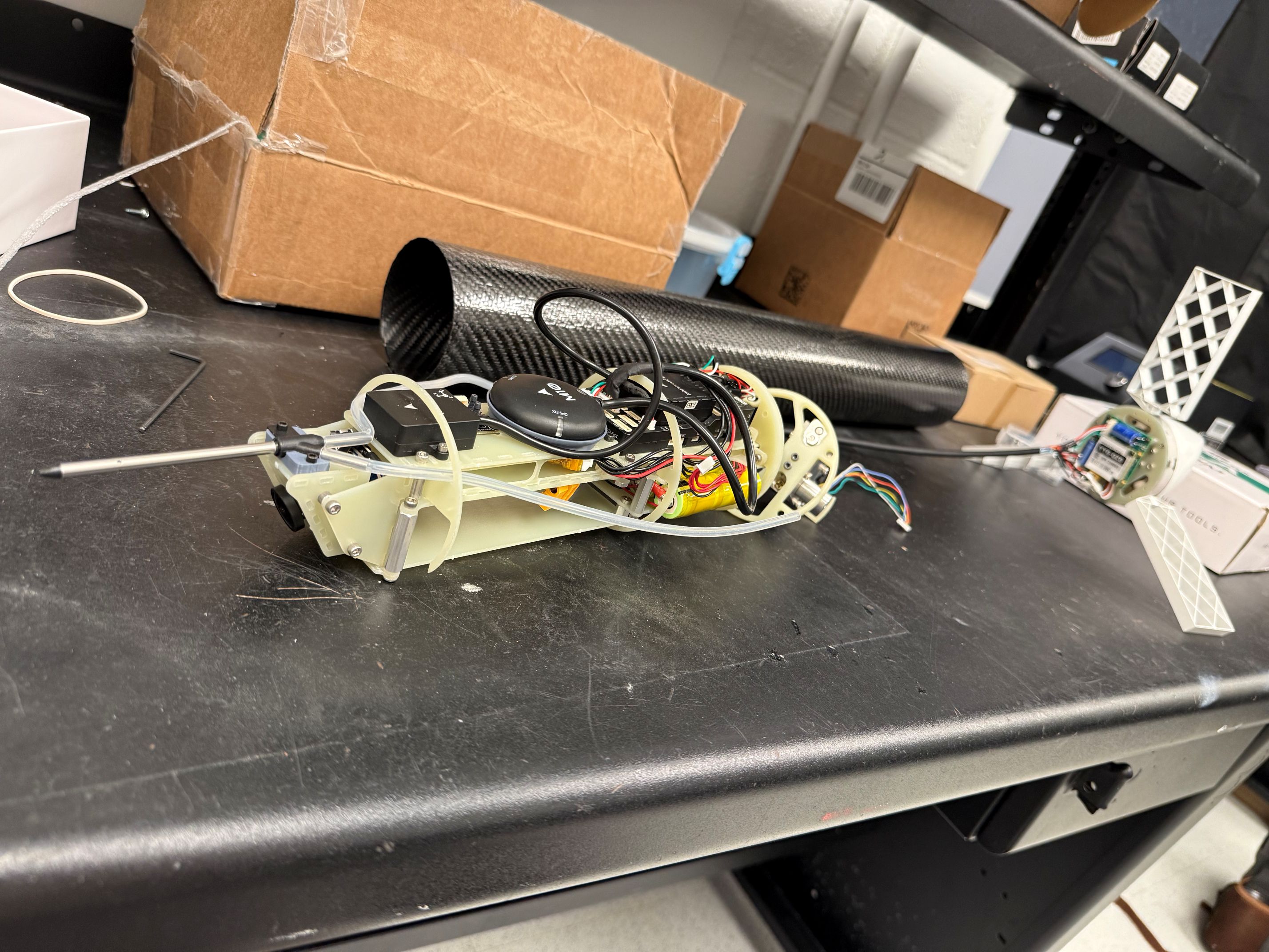 Nose internals, carbon body tube, and tail assembly